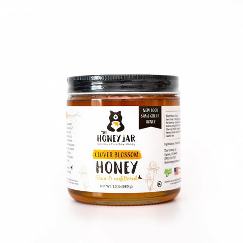 Jar of honey from The Honey Jar on a white background