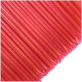 Red straws on a white background