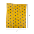 Yellow fabric with black bee pattern and measurements on a white background