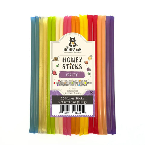 Pack of colorful honey sticks with The Honey Jar label on a white background