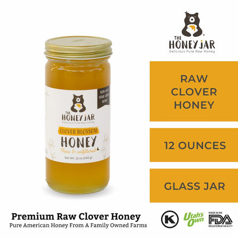 Jar of honey with 'The Honey Jar' branding on a white background