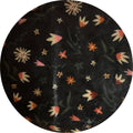 Round Floral pattern on a black background