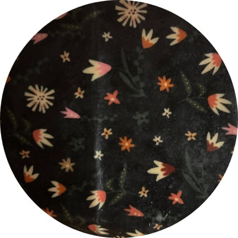 Round Floral pattern on a black background