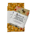 Set of two beeswax food wraps with floral patterns on a white background