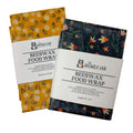 Two packages of beeswax food wrap with floral designs on a white background