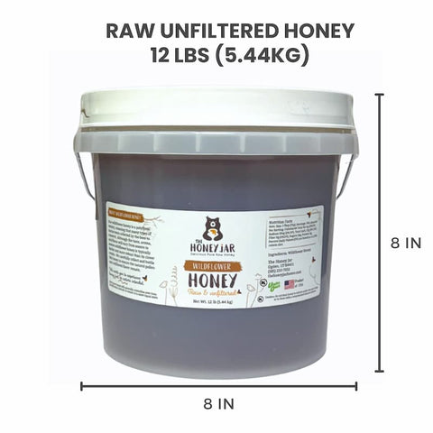 Bucket of raw unfiltered honey with dimensions on a white background