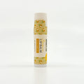 Lip balm with coconut design on a white background
