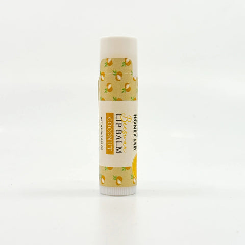 Lip balm with coconut design on a white background