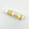 Lip balm with coconut flavor on a white background