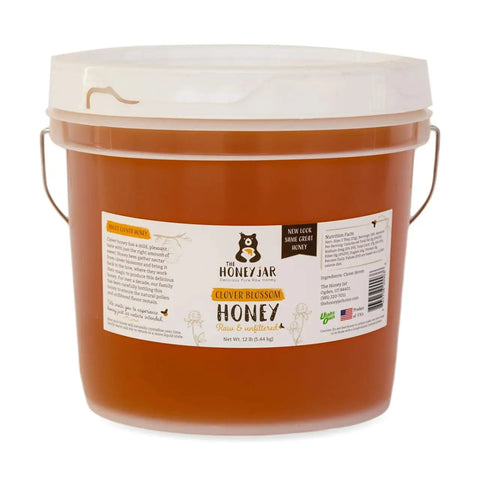 Honey bucket with a label on a white background