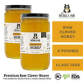 Two jars of honey with 'The Honey Jar' branding on a white background.