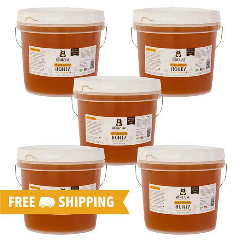 Five buckets of honey with labels on a white background, featuring free shipping text.