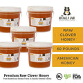 Multiple buckets of honey with 'The Honey Jar' branding on a white background