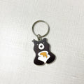 Keychain with cartoon bear design on a white background