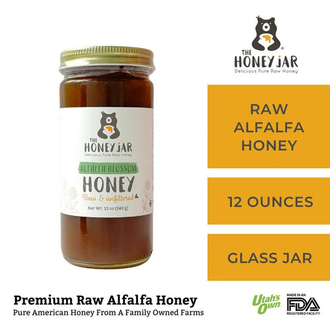 Jar of honey with 'The Honey Jar' branding on a white background