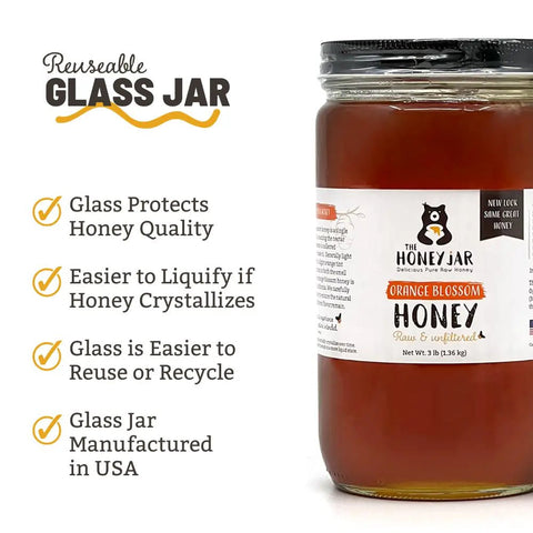 Jar of honey with a label on a white background, featuring text about reusable glass jars.