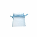 Blue transparent organza bag on a white background