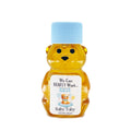 Honey bear bottle with personalized label on a white background