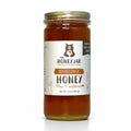 Jar of honey from The Honey Jar on a white background