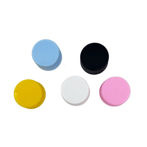 Five colorful plastic caps on a white background. Five colors shown: white, black, yellow, pink, and baby blue