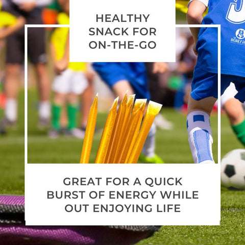 Snack sticks on a sports field with text about being a healthy snack for athletes.