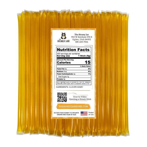 Honey sticks with a nutrition facts label on a white background