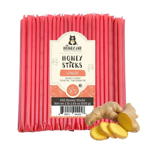 Pack of The Honey Jar ginger honey sticks with a ginger root on a white background