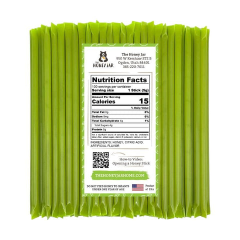 Pack of green honey sticks with a nutrition facts label on a white background