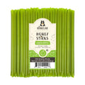Pack of green apple honey sticks with a label on a white background