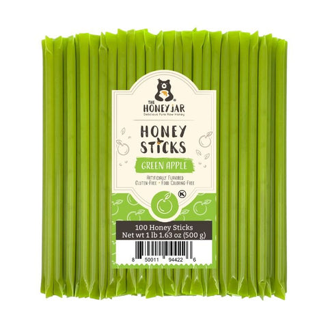 Pack of green apple honey sticks with a label on a white background
