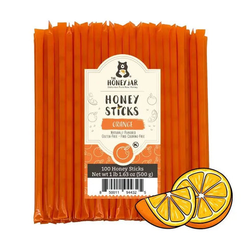 Pack of orange honey sticks with a visible brand label on a white background