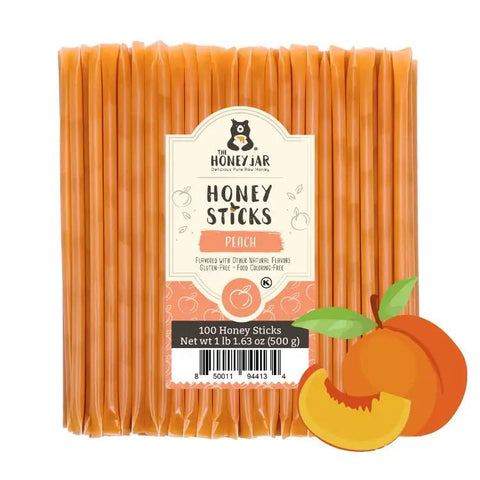 Pack of Honey Sticks with a label indicating peach flavor, accompanied by an illustration of a peach.