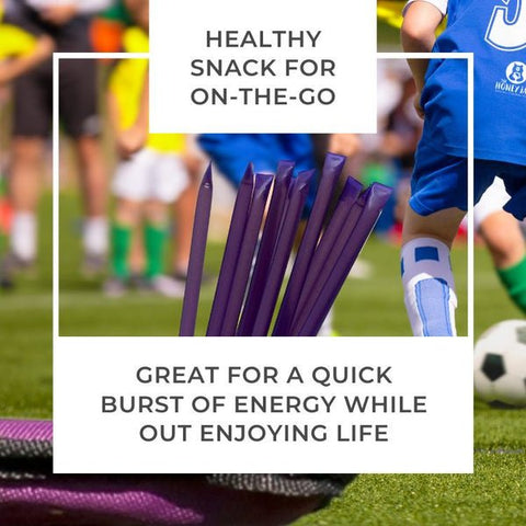 Purple straws in a holder with text about a healthy snack for on-the-go.