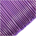 Purple straws arranged in a pattern on a white background