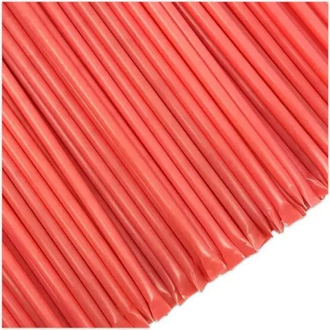 Red straws arranged in a pattern on a white background