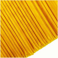 Close-up of yellow honey sticks on white background