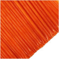Close-up of orange honey sticks on white background