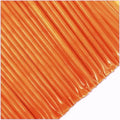 Close-up of orange honey sticks on a white background