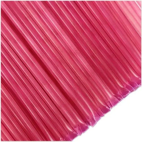 Close-up of pink honey sticks with a white background