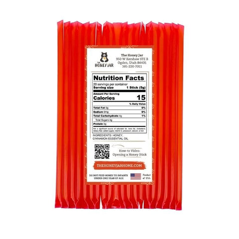 Red honey sticks packaging with nutrition facts label on a white background