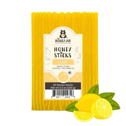 Pack of Honey Sticks with lemon graphics on a white background