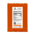 Orange honey stick packaging with a nutrition facts label on a white background