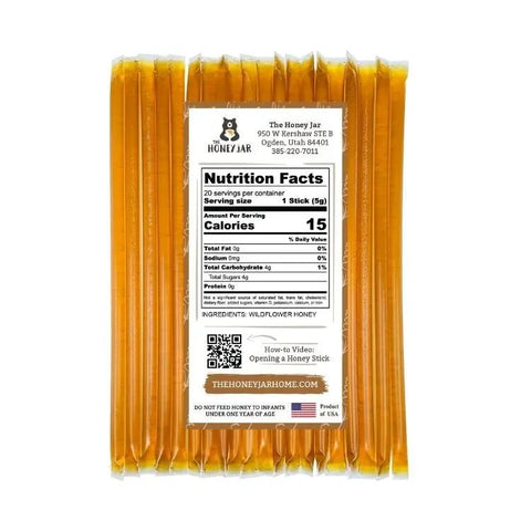 Packaging of honey sticks with a label on a white background