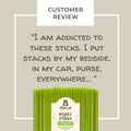 Pack of green honey sticks with a customer review quote on a beige background