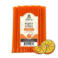 Pack of orange honey sticks with a label on a white background