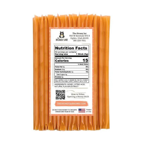 Packaging of honey sticks with a nutrition facts label on a white background