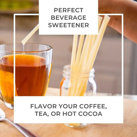 Glass of tea with a honey stick and text about perfect beverage sweetener.