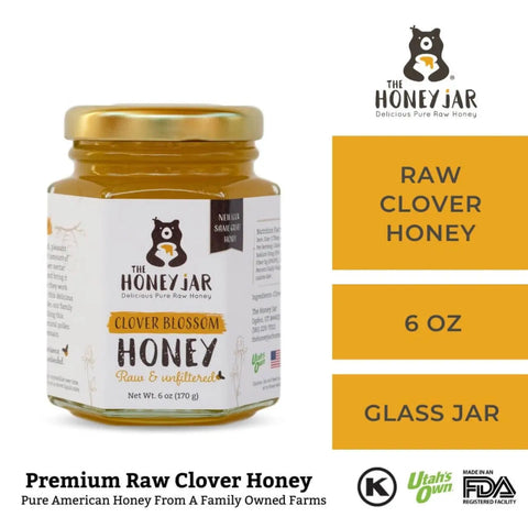 Jar of honey with 'The Honey Jar' branding on a white background