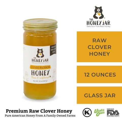 Jar of honey with 'The Honey Jar' branding on a white background