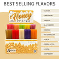 Display of Honey Sticks with various flavors on a beige background